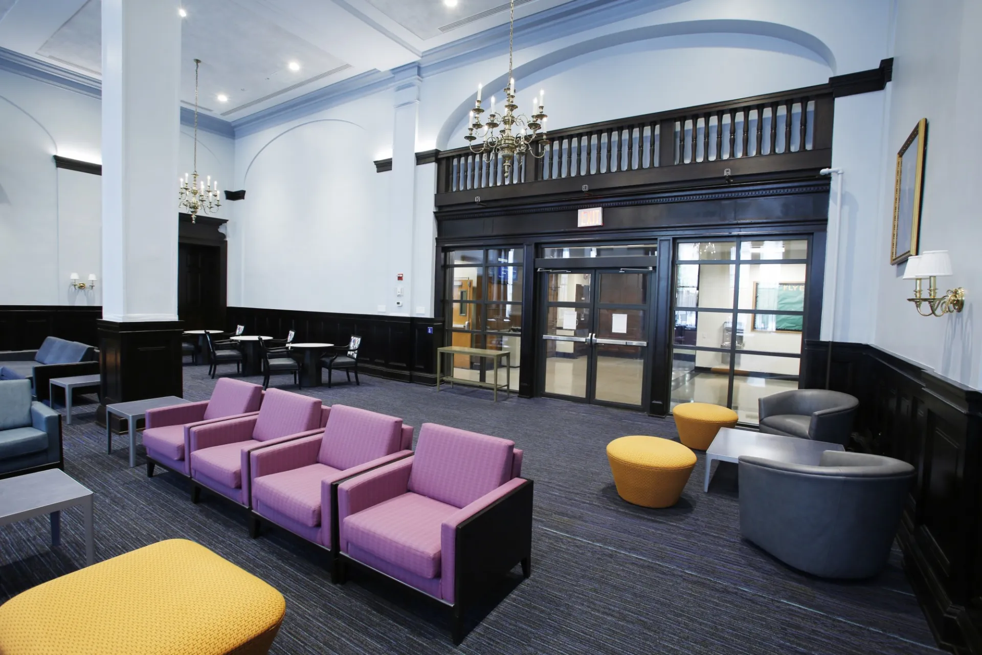 A view of the large wood and glass doors that open to John Jay Lounge.